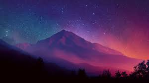 Abstract mountain landscape with layered peaks under a starlit atmospheric sky
